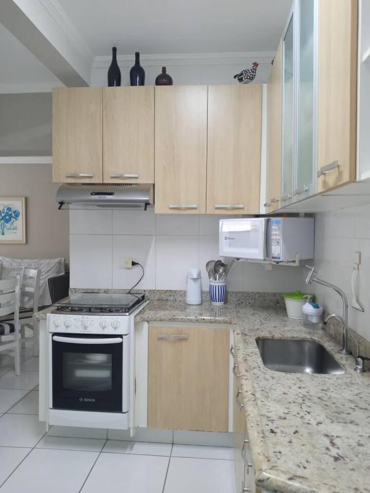 Apartamento completo na calçada da praia Daire Guarujá Dış mekan fotoğraf